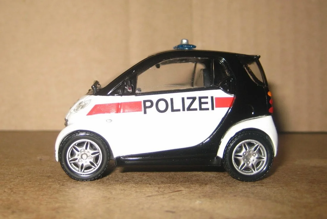 Полицейские машины мира №45 SMART CITY COUPE - миниатюра 5