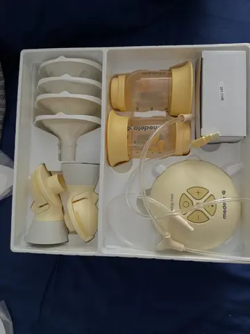 Молокоотсос medela электрический swing maxi flex
