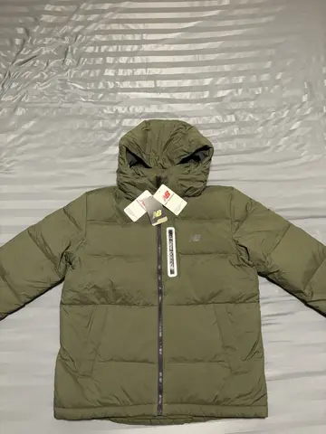 Пуховик New balance размер M.