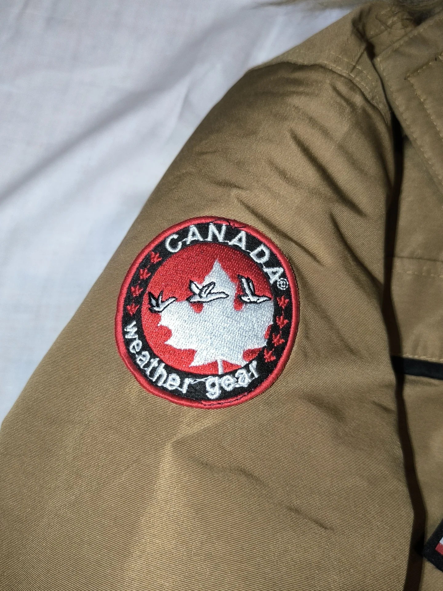 Удобный пуховик для мальчика Canada Goos - миниатюра 10