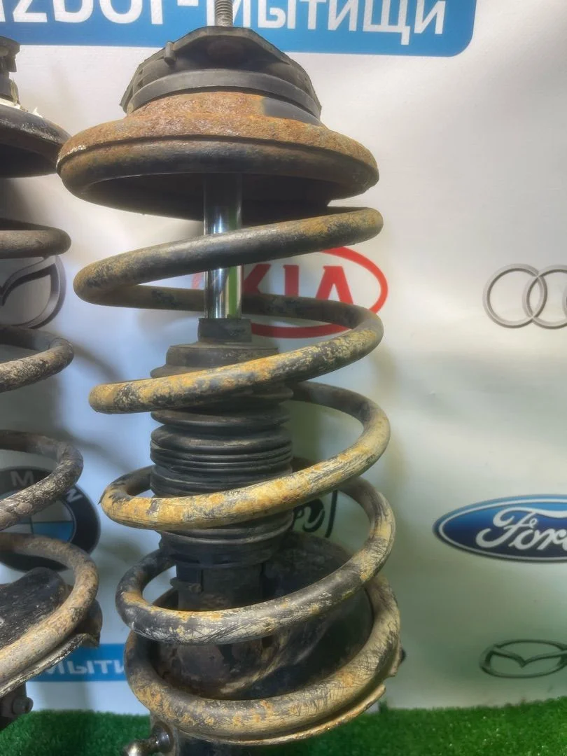 Стойка амортизатора передняя левая Ford Focus - миниатюра 4