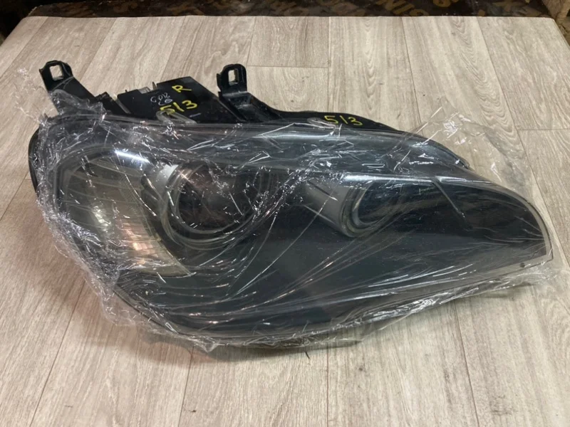 Фара ксеноновая передняя правая BMW X5 E70 N62B48B - миниатюра 2