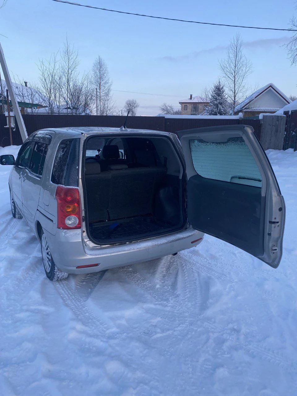 Toyota Raum-2005 год. - миниатюра 12
