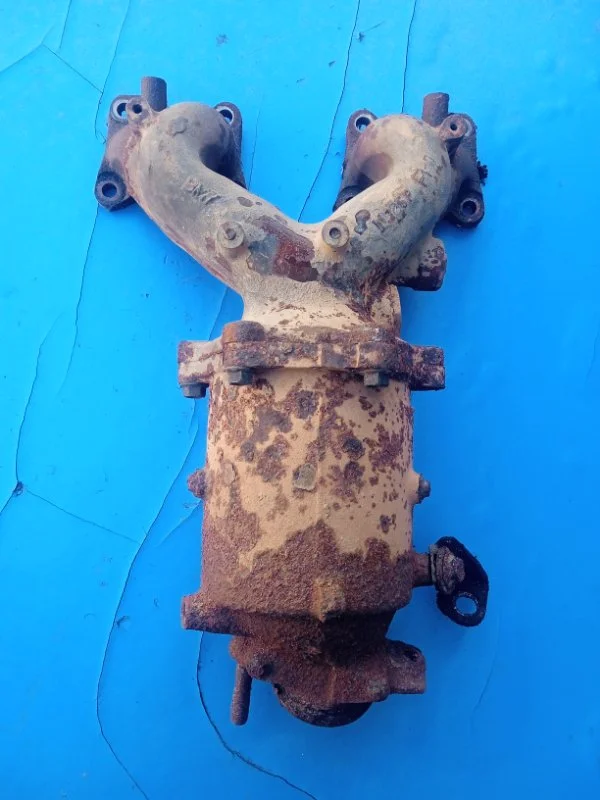 Выпускной коллектор Nissan альмера N16 СЕДАН 1.5 - изображение 1