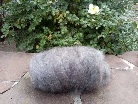Козий пух чесаный стираный