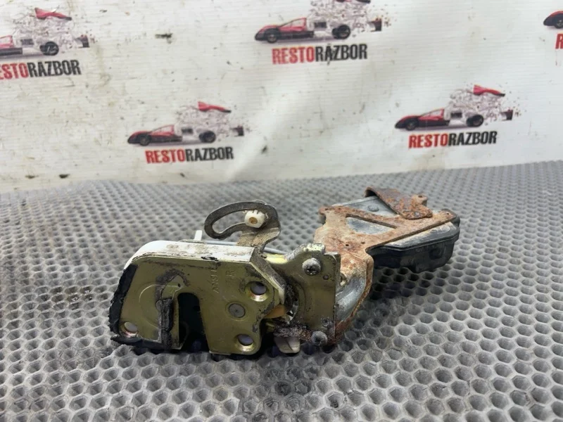 Замок боковой двери задний правый Mitsubishi - миниатюра 7