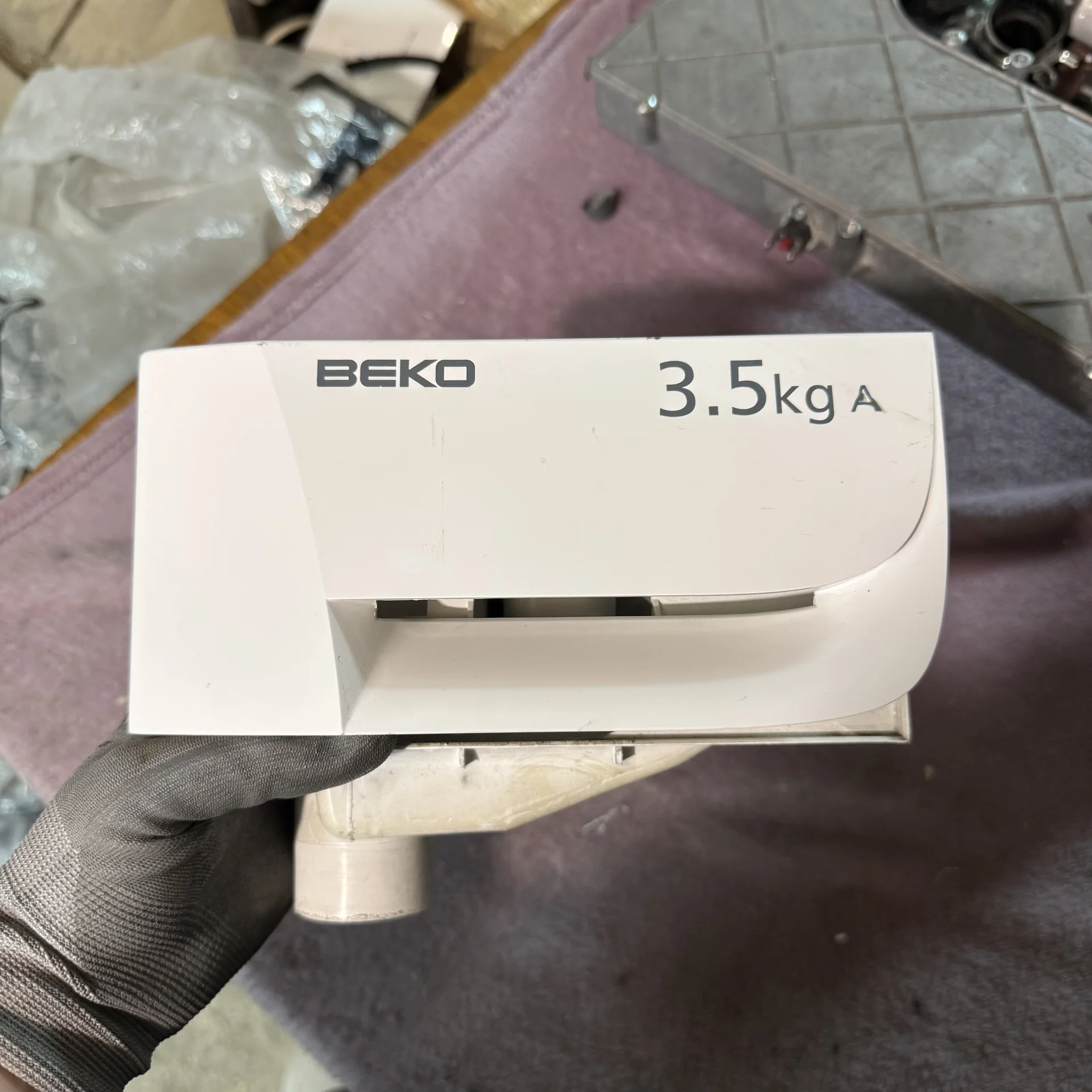 Порошкоприемник стиральной машины Beko