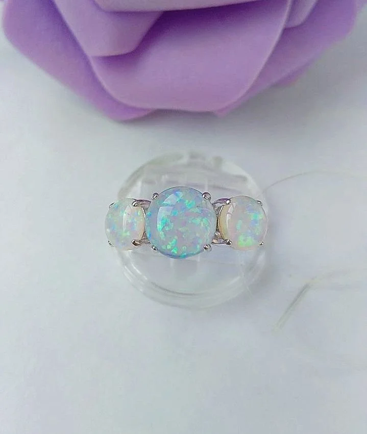 Серебряное кольцо с опалами - изображение 1
