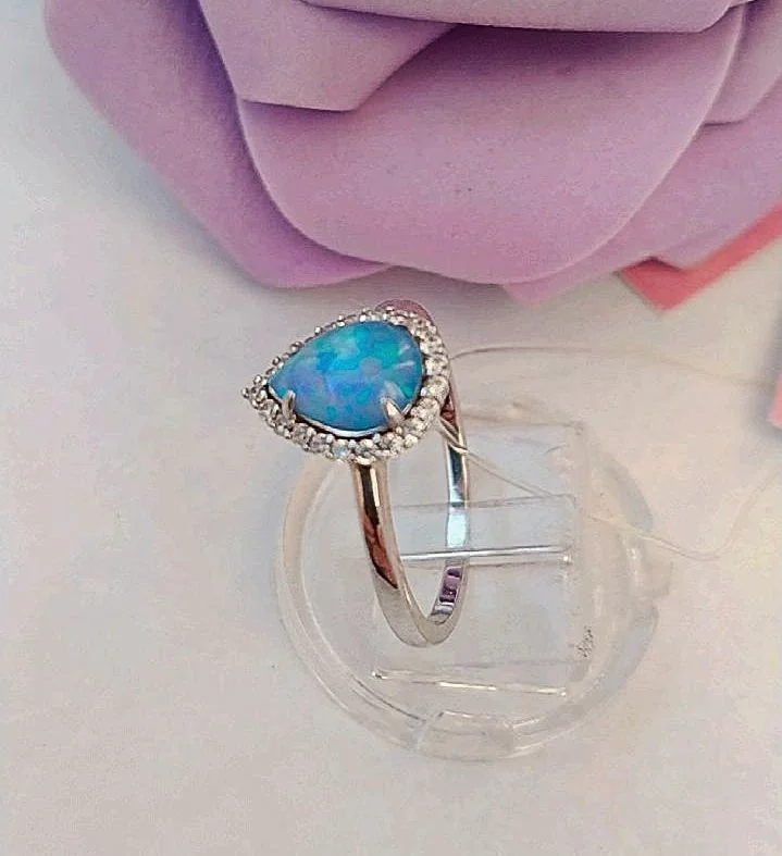 Серебряное кольцо с голубым опалом - миниатюра 2