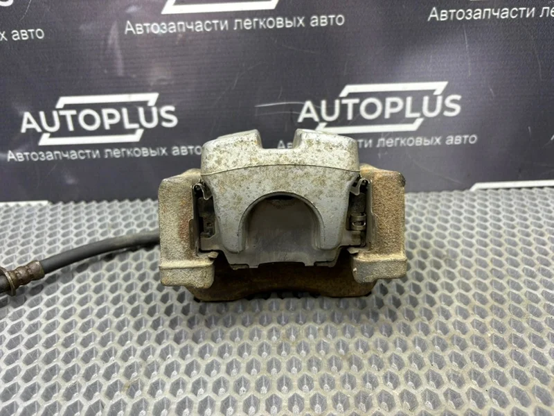 Суппорт тормозной задний левый Toyota Camry XV40 - миниатюра 4