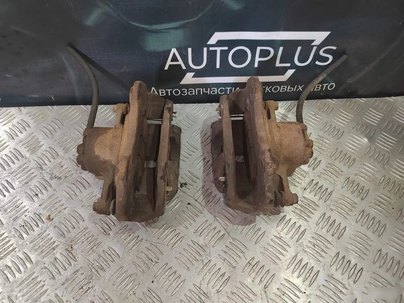 Суппорт тормозной передний Mitsubishi Lancer 9 - миниатюра 2