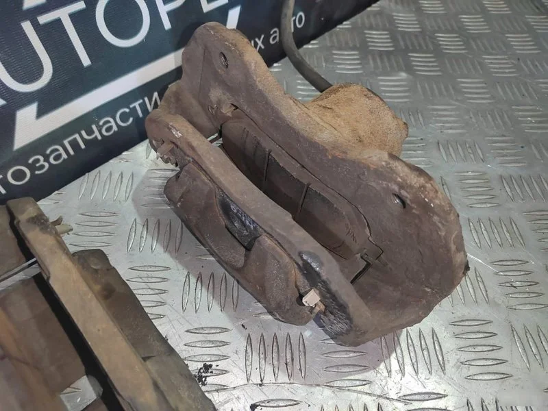 Суппорт тормозной передний Mitsubishi Lancer 9 - миниатюра 6