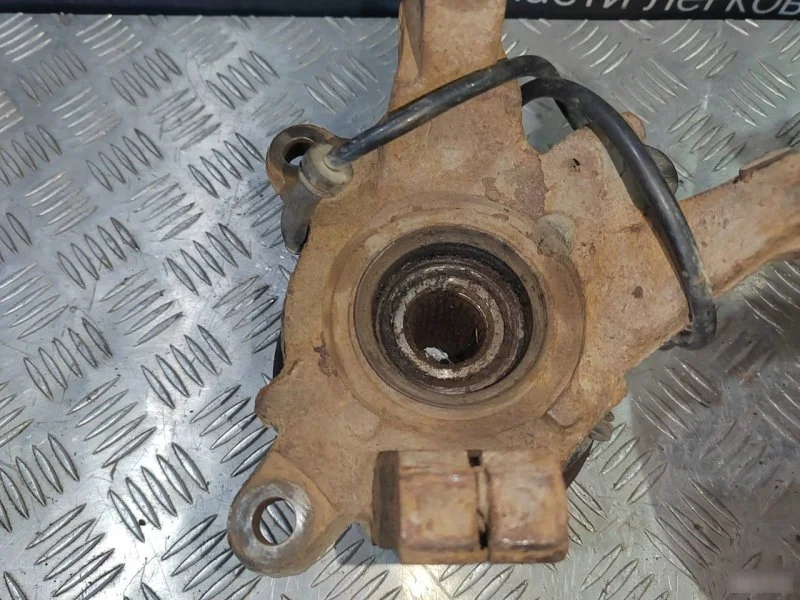 Поворотный кулак со ступицей передний Mitsubishi - миниатюра 4