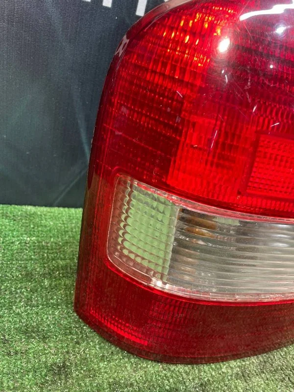 Фонарь задний левый Mazda Protege СЕДАН 1.6 ZM - миниатюра 4