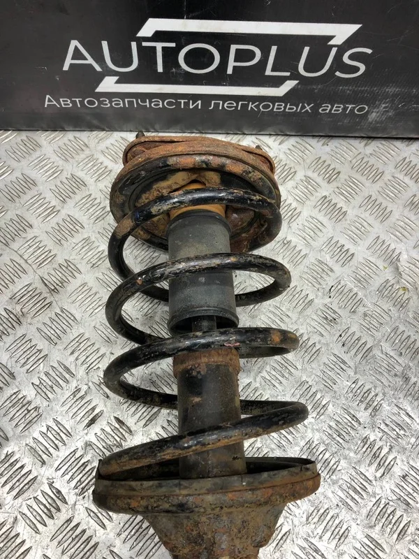 Стойка подвески передняя правая Mitsubishi Lancer - миниатюра 8