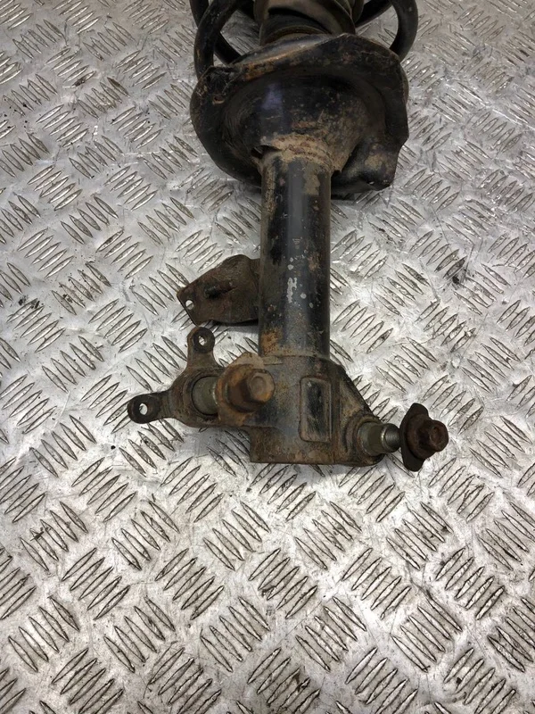 Стойка подвески передняя левая Nissan Primera P12 - миниатюра 4