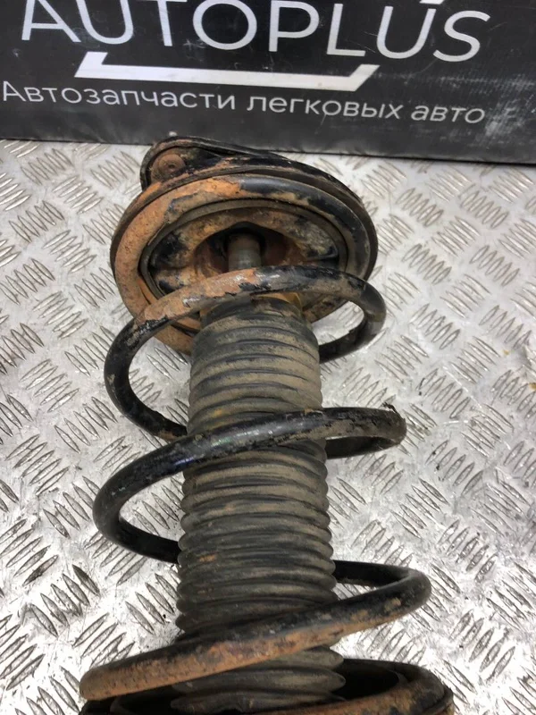 Стойка подвески передняя левая Mitsubishi Lancer - миниатюра 8