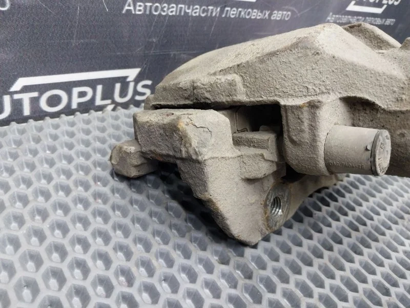 Суппорт тормозной передний левый Ford Focus - миниатюра 4