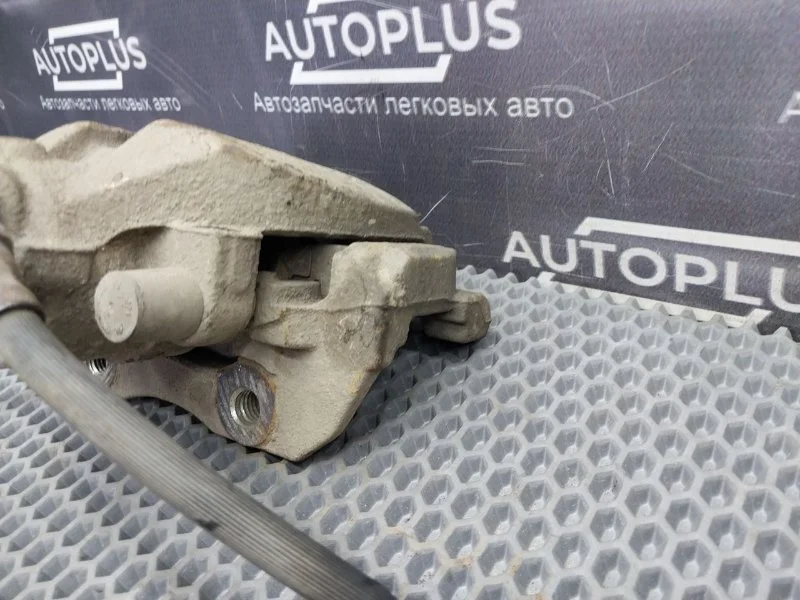 Суппорт тормозной передний левый Ford Focus - миниатюра 5