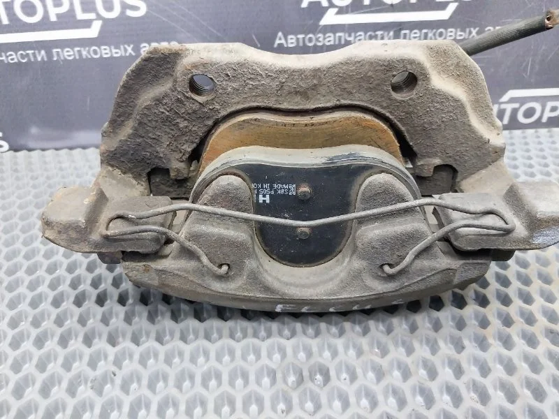 Суппорт тормозной передний левый Ford Focus - миниатюра 8
