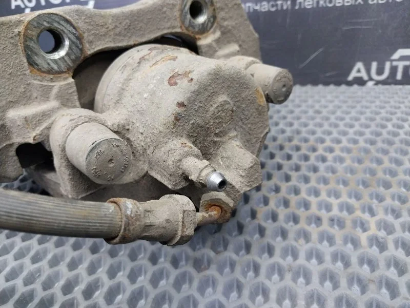 Суппорт тормозной передний левый Ford Focus - миниатюра 9