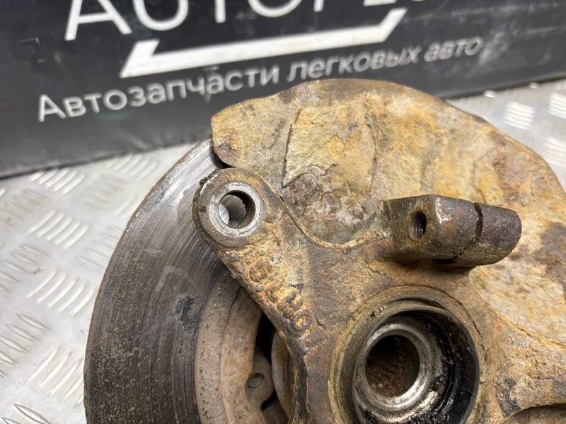 Поворотный кулак со ступицей передний левый Daewoo - миниатюра 6