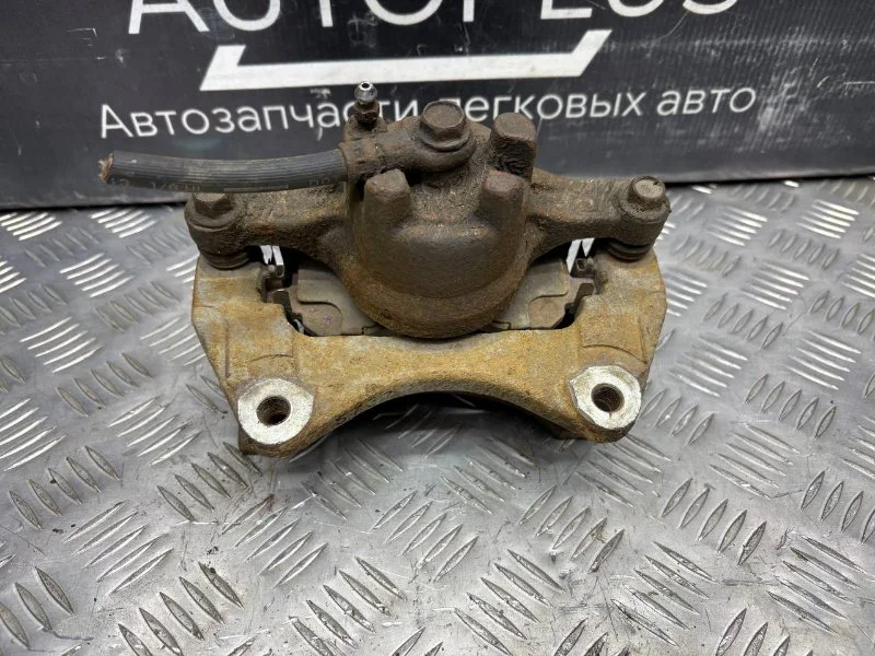 Суппорт тормозной передний левый Mitsubishi - миниатюра 7