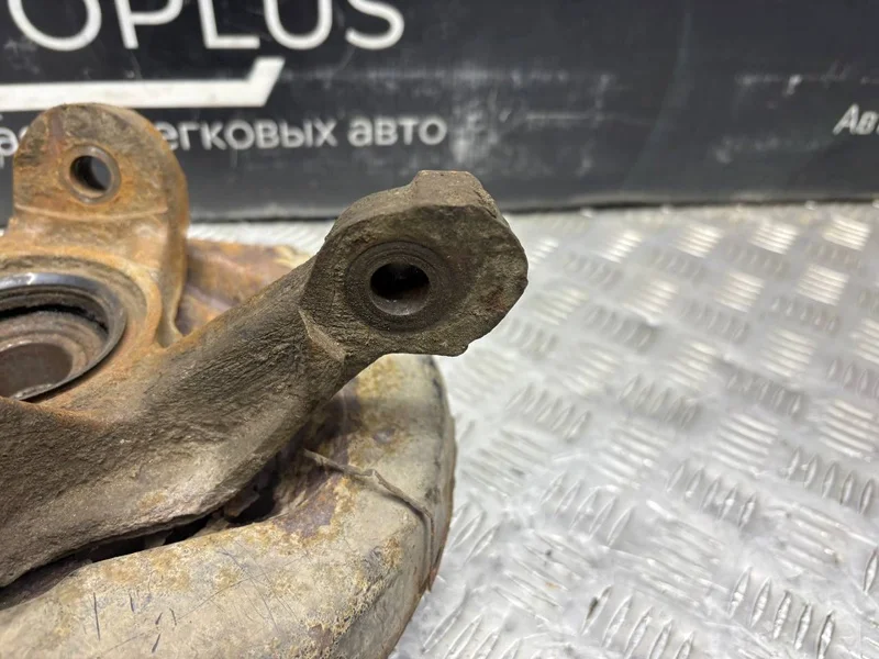 Поворотный кулак со ступицей передний левый Toyota - миниатюра 8