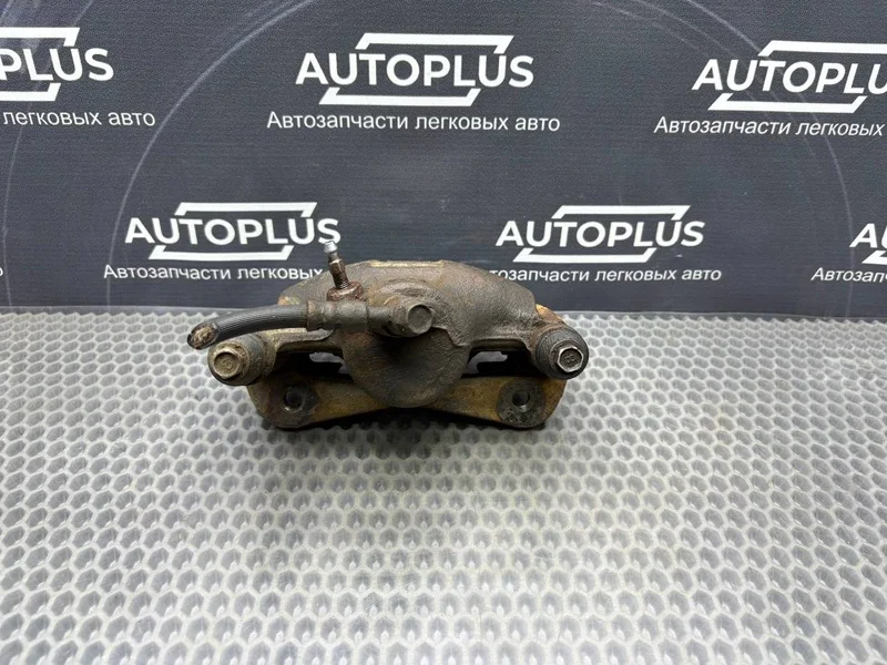 Суппорт тормозной передний левый Toyota Sprinter - миниатюра 5