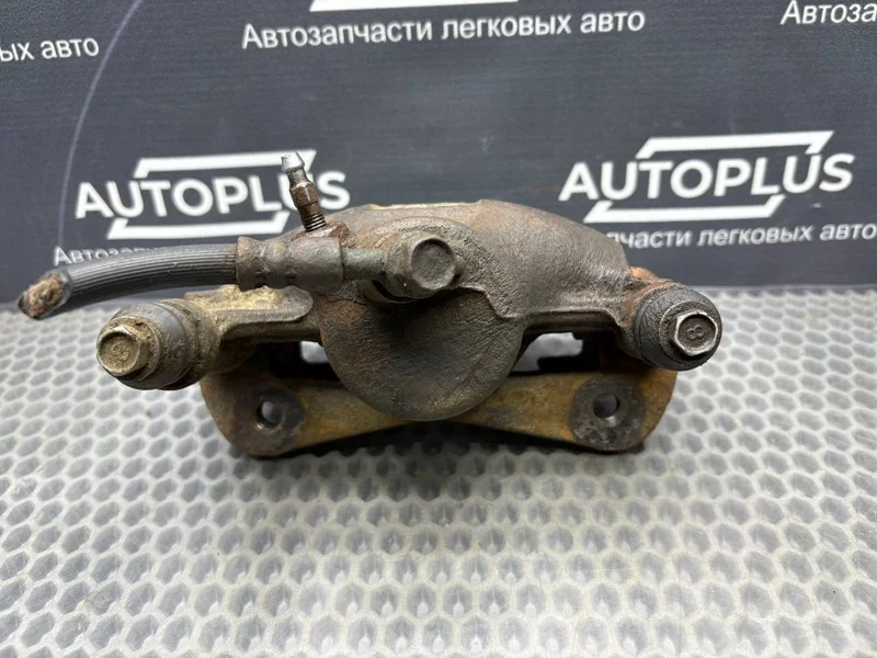 Суппорт тормозной передний левый Toyota Sprinter - миниатюра 6