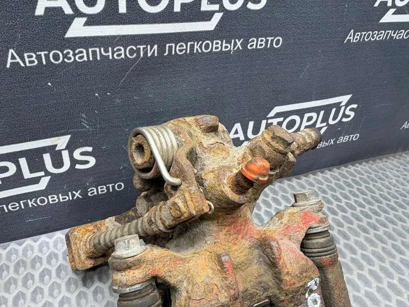 Суппорт тормозной задний левый Rover 400 ХЕТЧБЭК - миниатюра 4