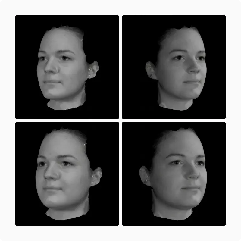 Four grayscale 3D facial scans of a young woman from different angles