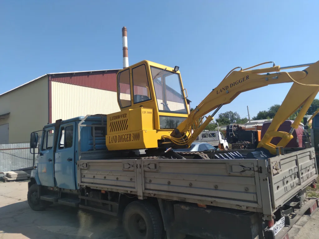 Транспортируем экскаватор из по Белгородской области