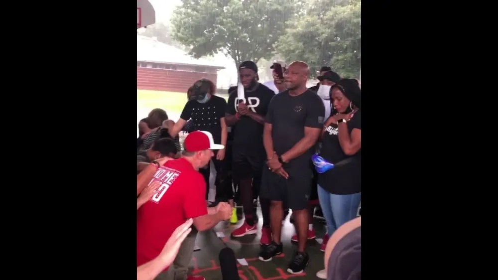 White people kneel, ask forgiveness from the black community in Third Ward