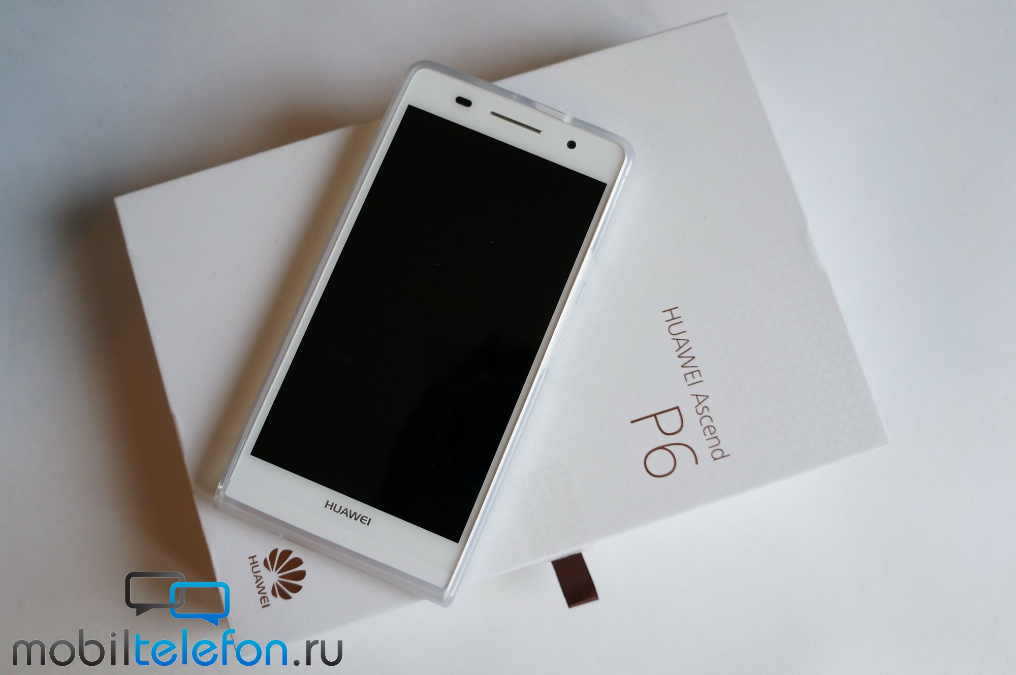 Распаковка Huawei Ascend P6 в белом цвете (видео)