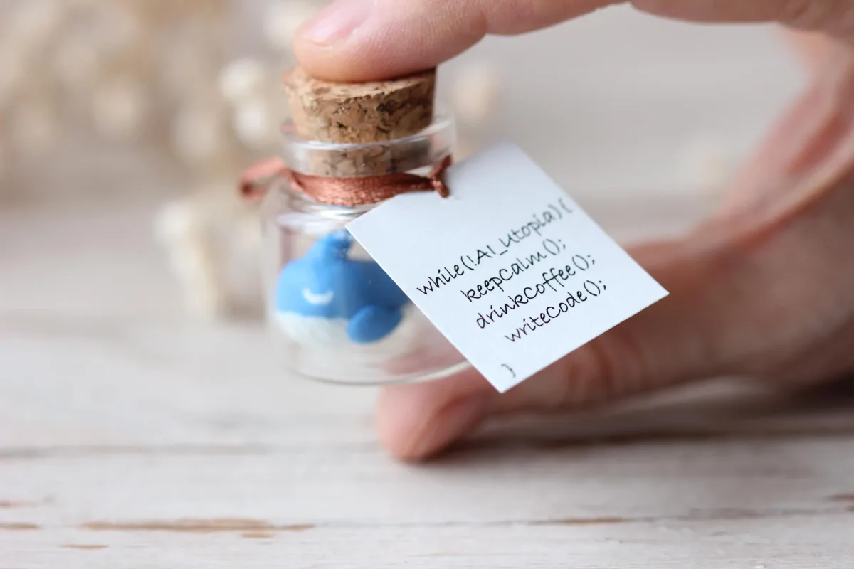 Blue Whale with Code Plaque – 'while(!AI_Utopia){ keepCalm(); drinkCoffee(); writeCode(); }' – Unique Gift for Programmers, Geek Decor