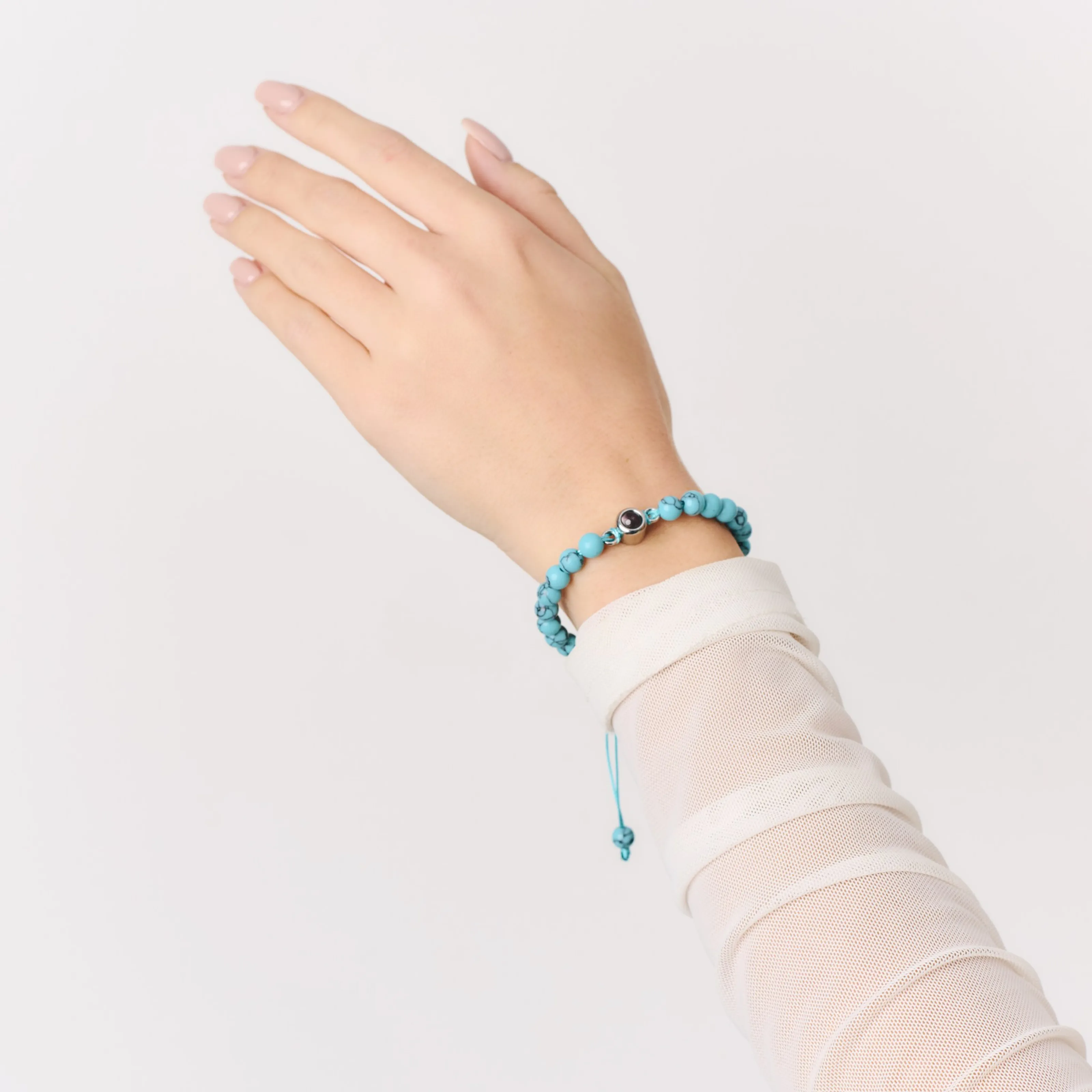 Браслет из бирюзового кахолонга с миниатюрной фотографией внутри