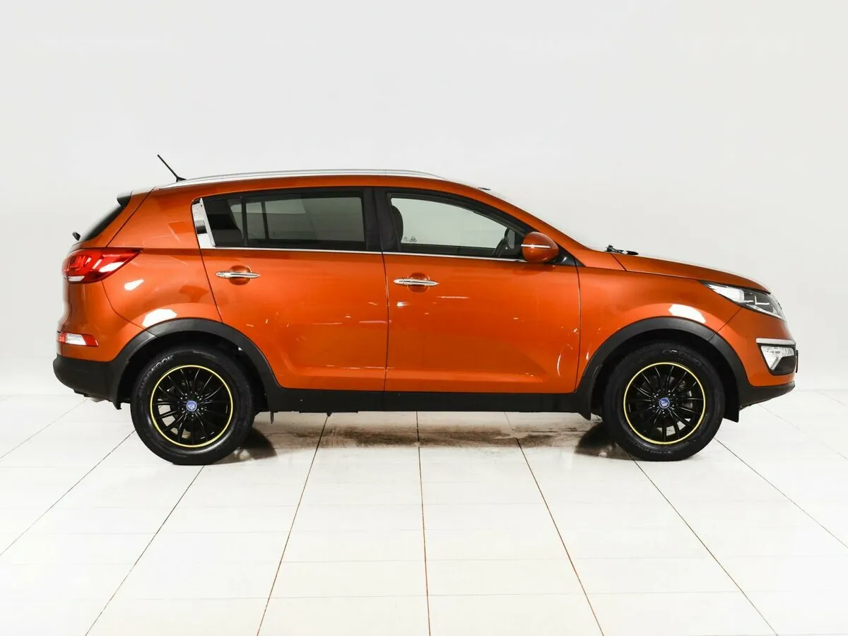 Kia Sportage III Рестайлинг — фото 4
