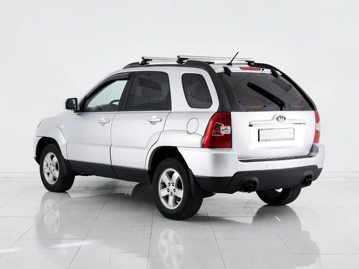 Kia Sportage II Рестайлинг — фото 4