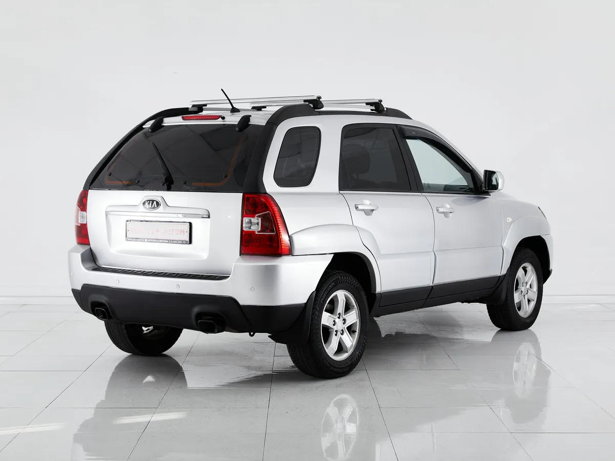 Kia Sportage II Рестайлинг — фото 5
