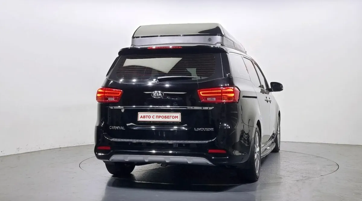 Kia Carnival III — фото 4