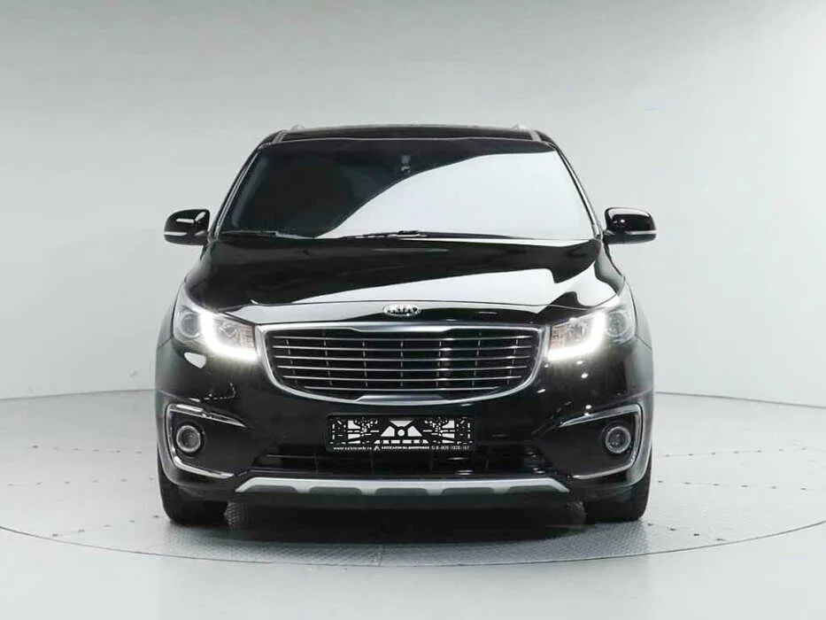 Kia Carnival III — фото 2