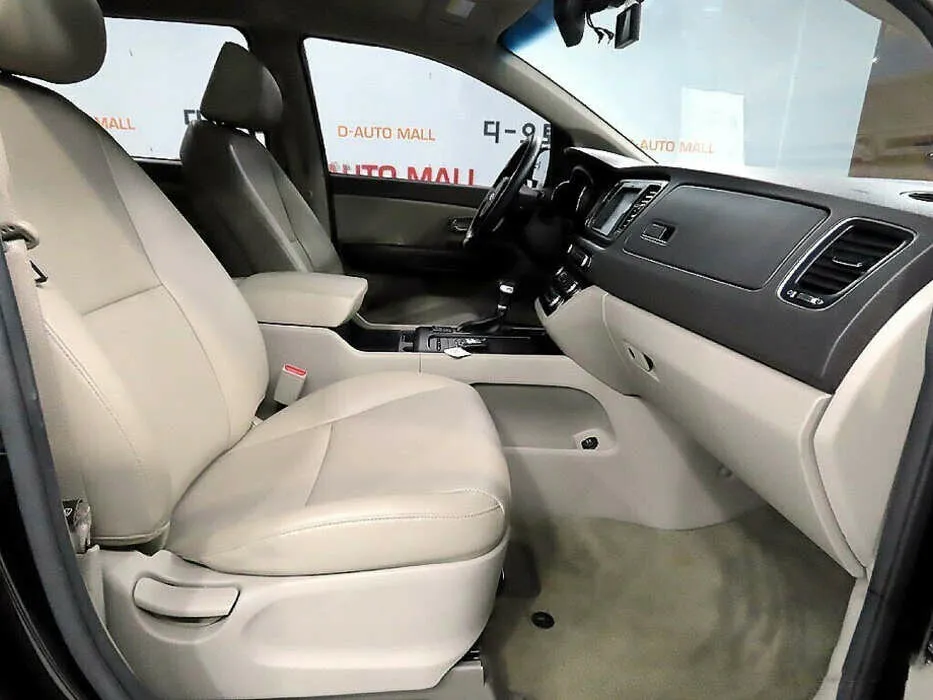 Kia Carnival III — фото 5