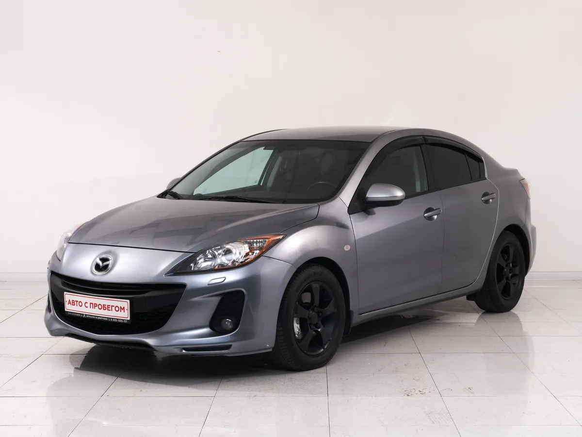Mazda 3 II (BL) Рестайлинг · Touring Plus
