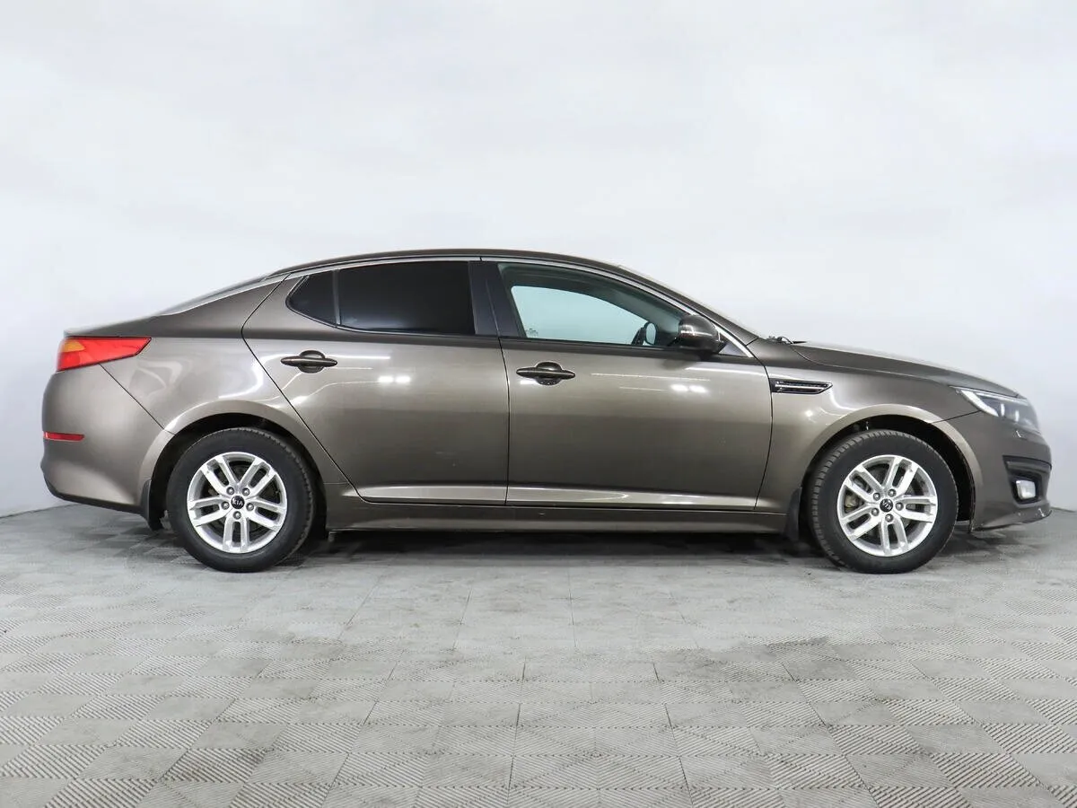 Kia Optima III Рестайлинг — фото 3