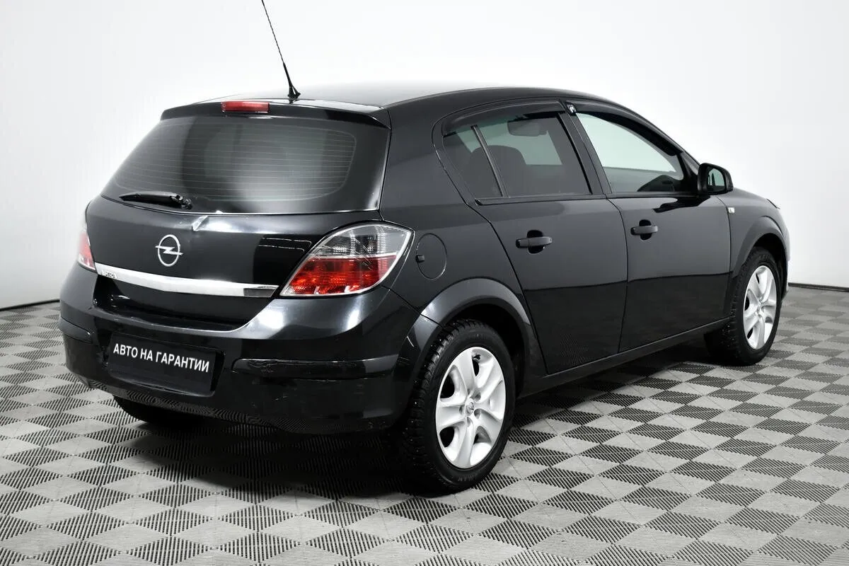Opel Astra H Рестайлинг · Enjoy — фото 3