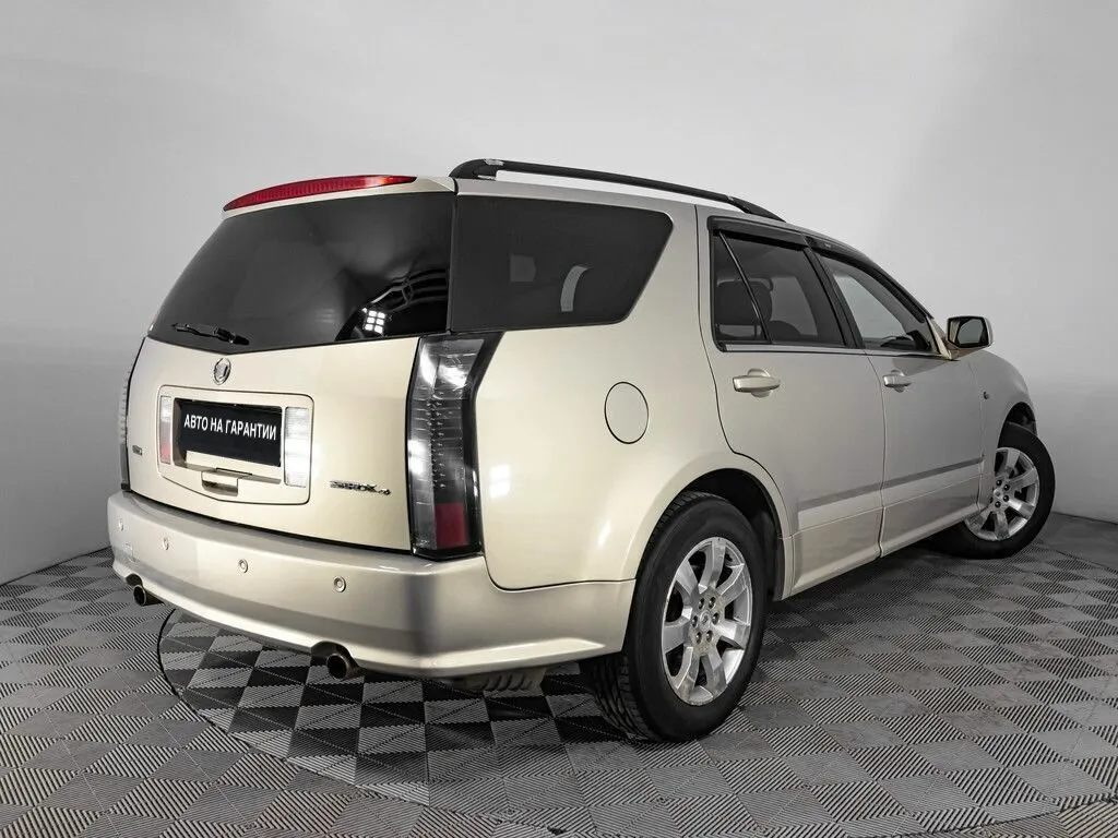 Cadillac SRX I — фото 4