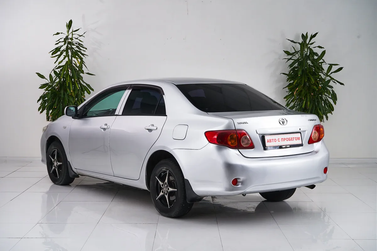 Toyota Corolla X (E140, E150) · Комфорт — фото 4