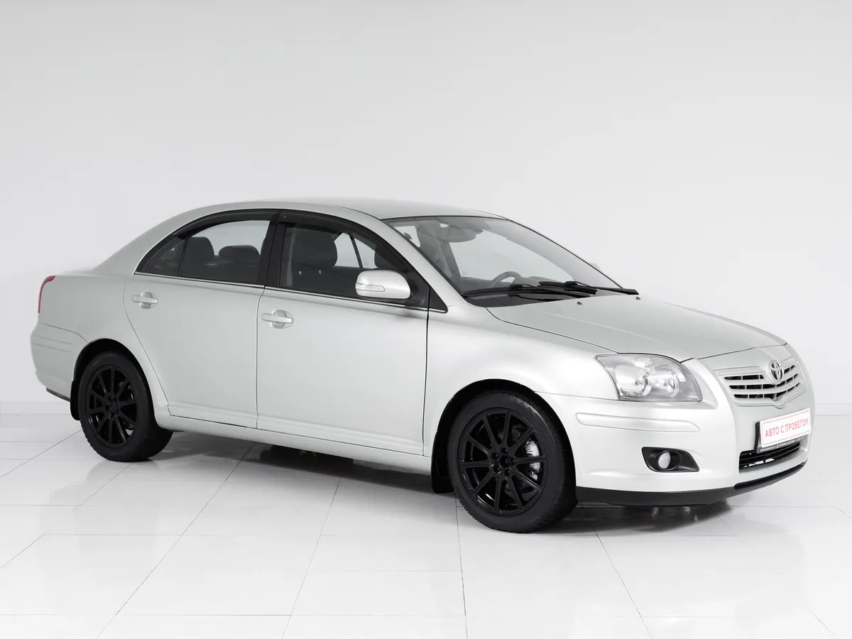 Toyota Avensis II Рестайлинг · Сол — фото 3