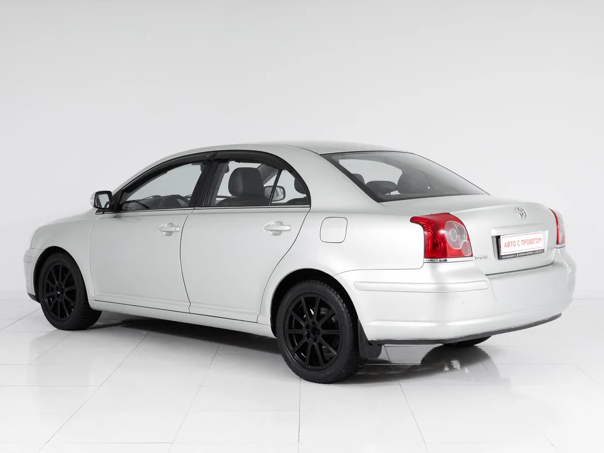 Toyota Avensis II Рестайлинг · Сол — фото 4